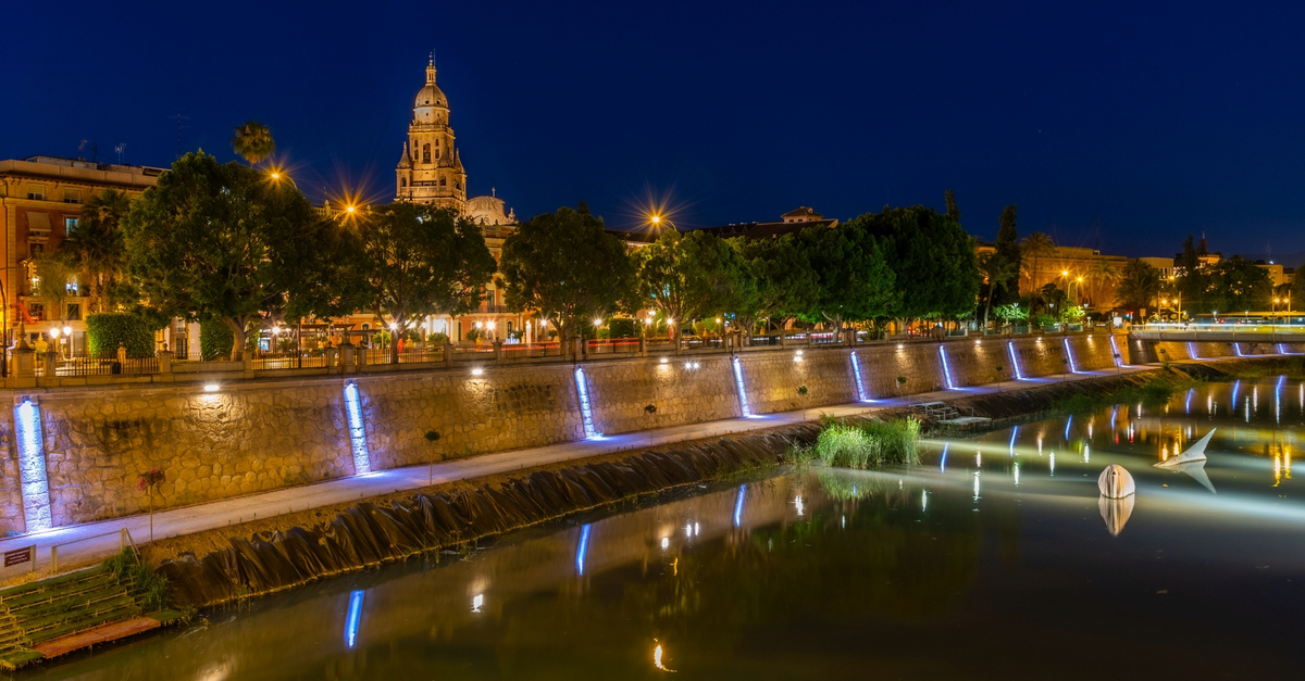 Murcia: night view of the Segura river.