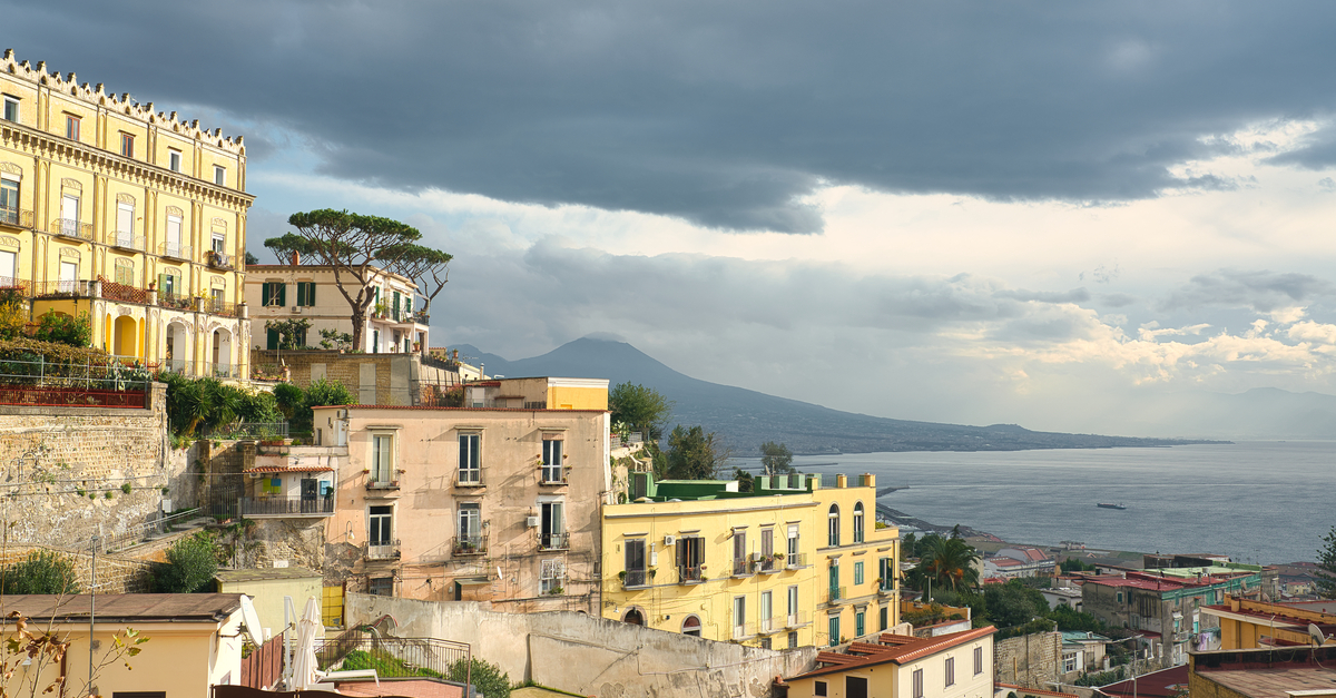 Naples: traditional small streets of yellow buildings.