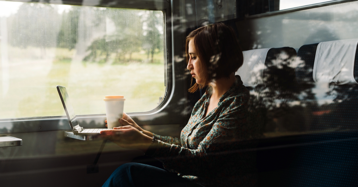 Travel from Pisa city centre to Pisa train station: woman on a train