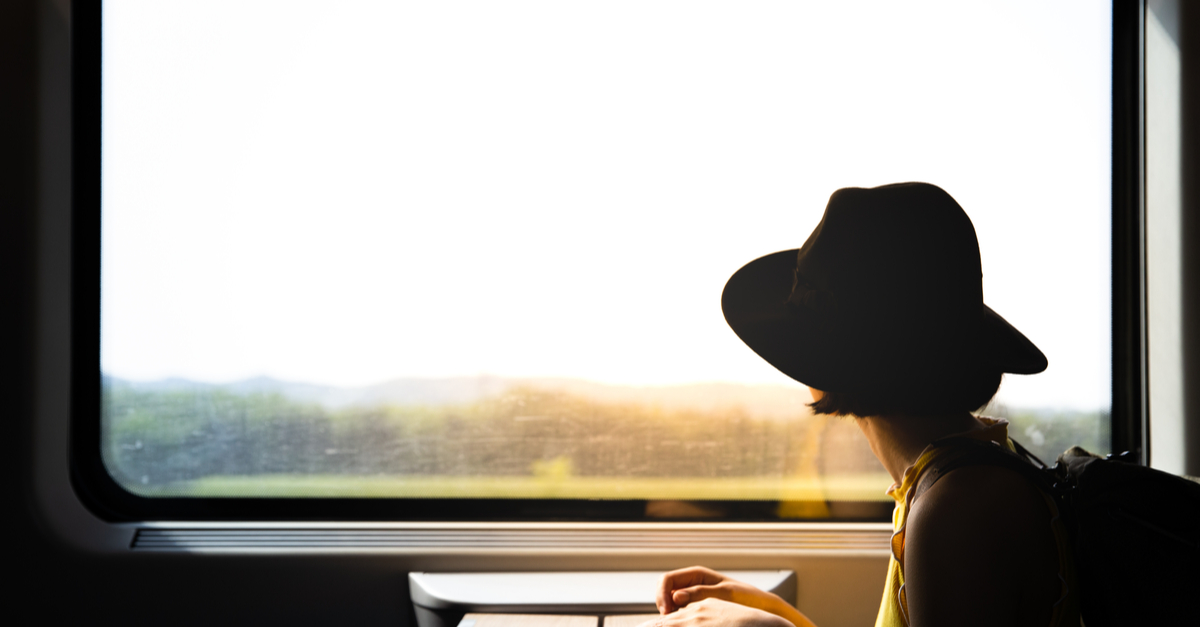 Travel from Saint-Raphaël city centre to Saint-Raphaël train station: woman on a train